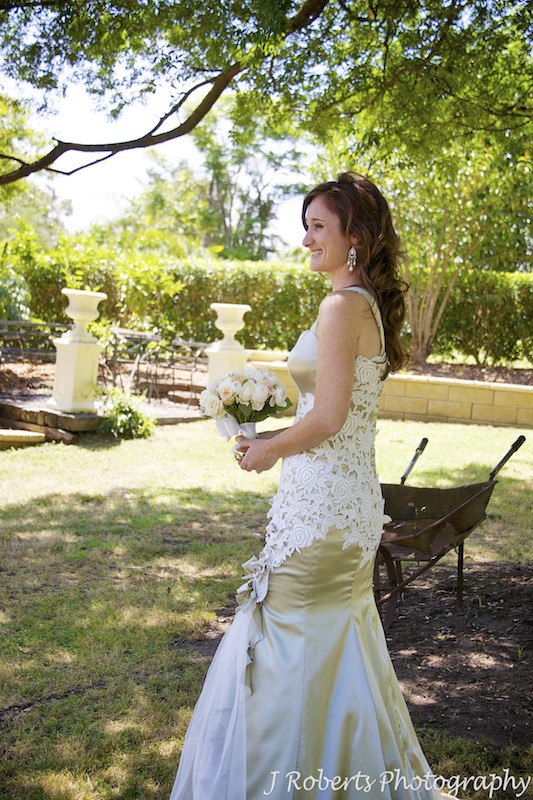 Bride smiling in the garden - wedding photography sydney